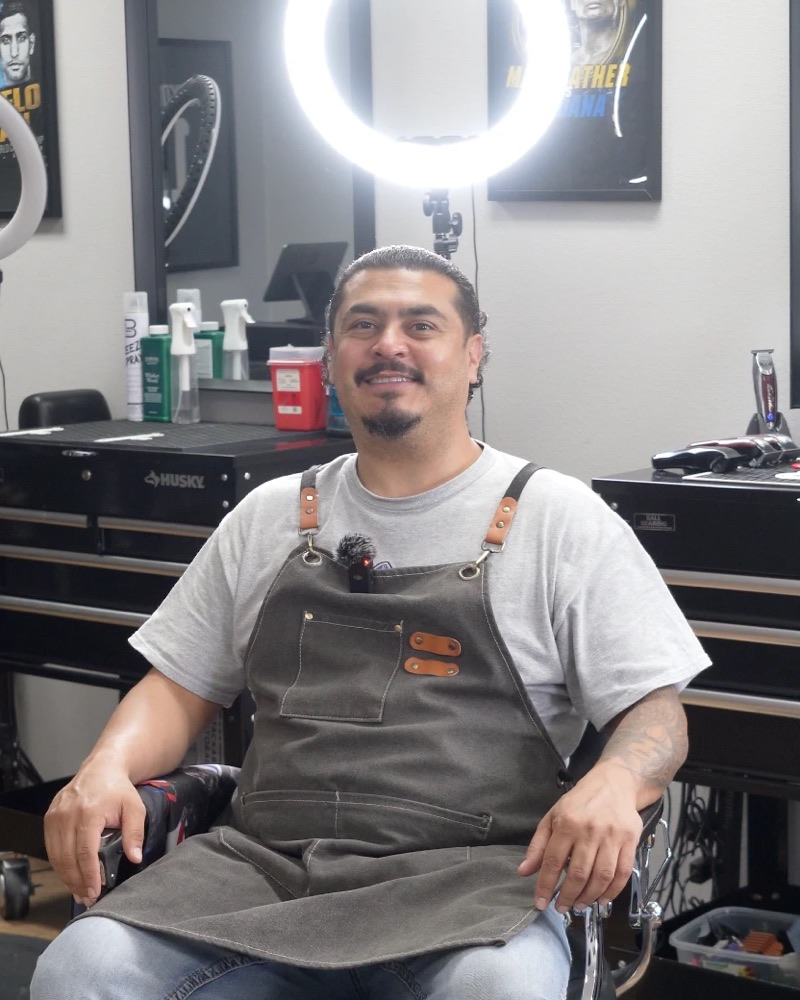 Renzo, owner and barber at Renzos Barbershop in Fort Collins